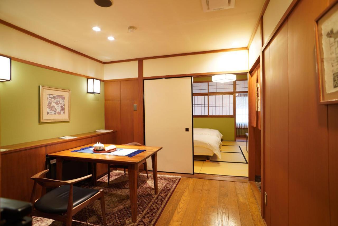 Отель Arima Onsen Tocen Goshobo Кобе Экстерьер фото A room at a ryokan