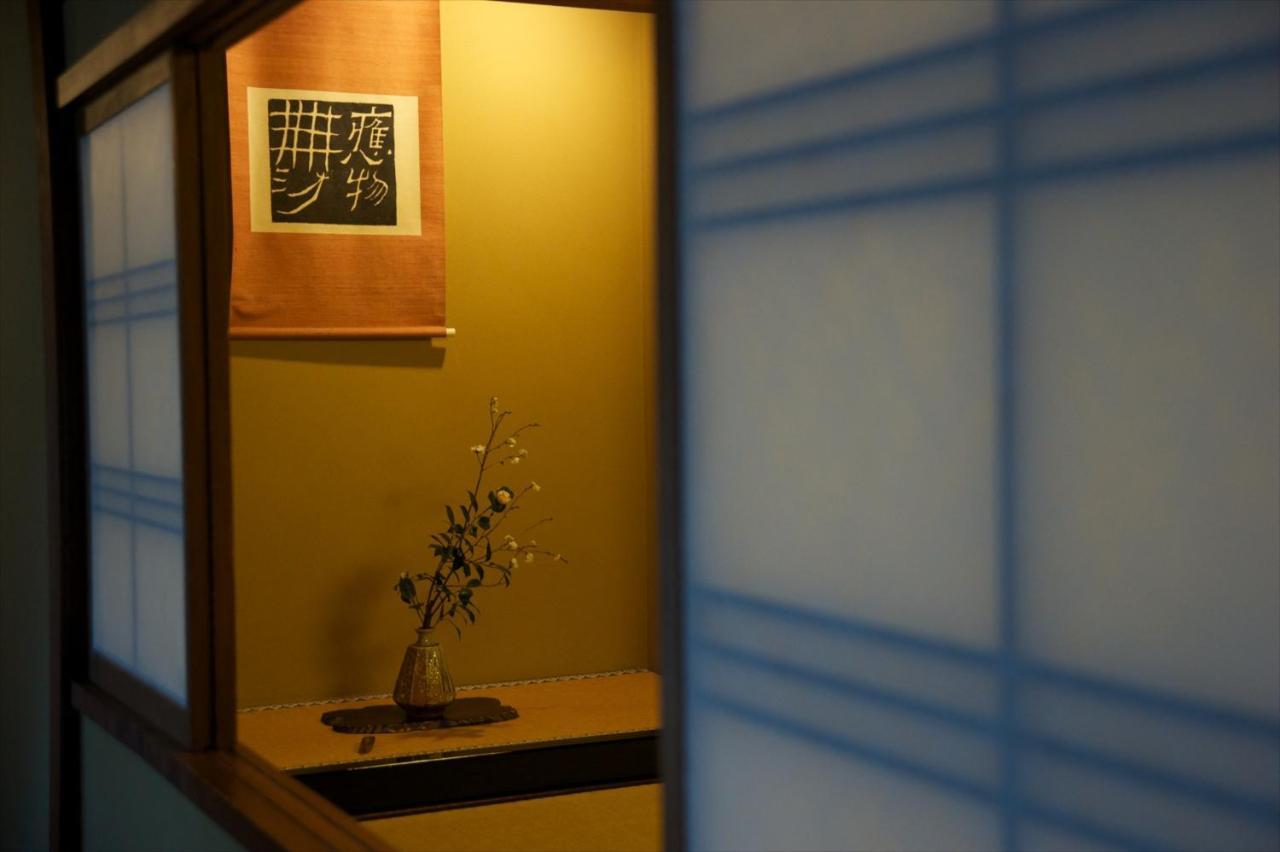 Отель Arima Onsen Tocen Goshobo Кобе Экстерьер фото Ikebana